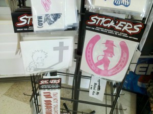Rural Stickers Two car decals, one of Calvin, of Calvin and Hobbes, praying to a cross, the other of a naked woman wearing a cowboy hat in silhouette.